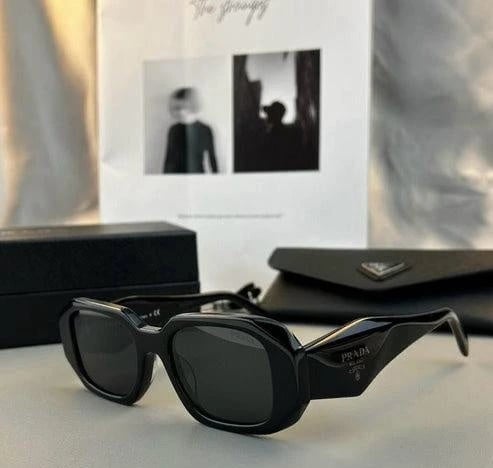 Prada | نظارة شمسية Symbole مستطيلة – أزرق