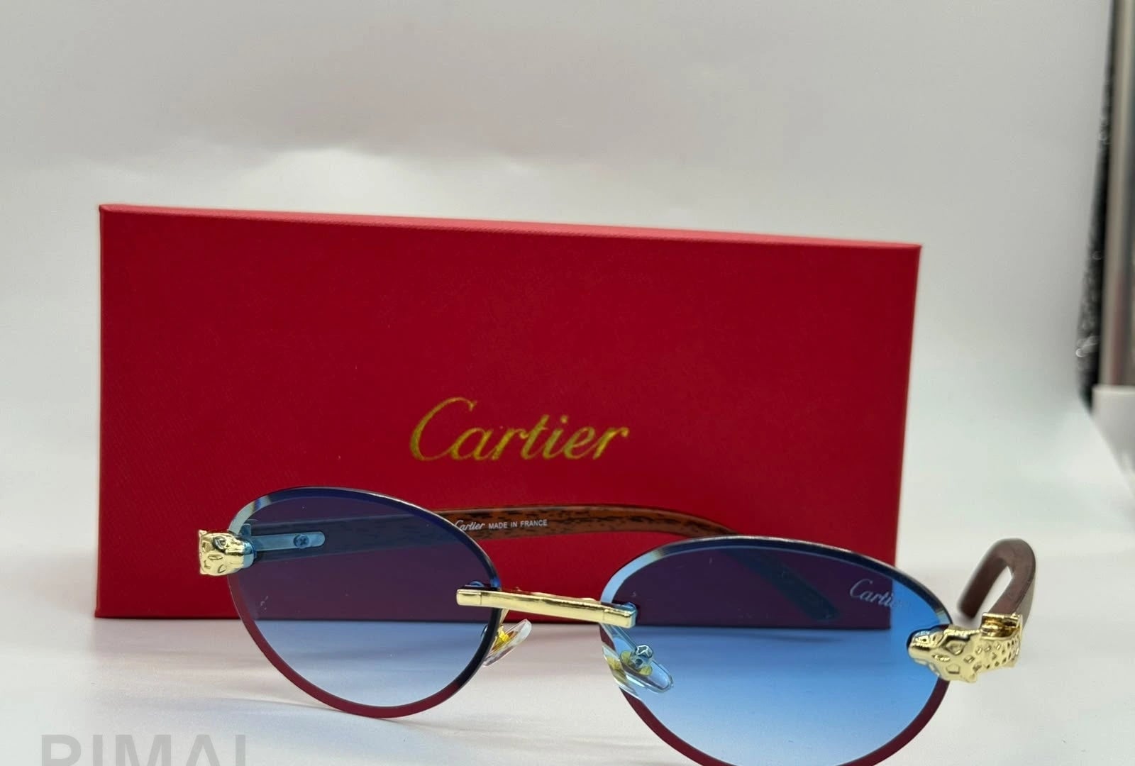 Cartier | Première Rimless Sunglasses – Gold / Grey Gradient