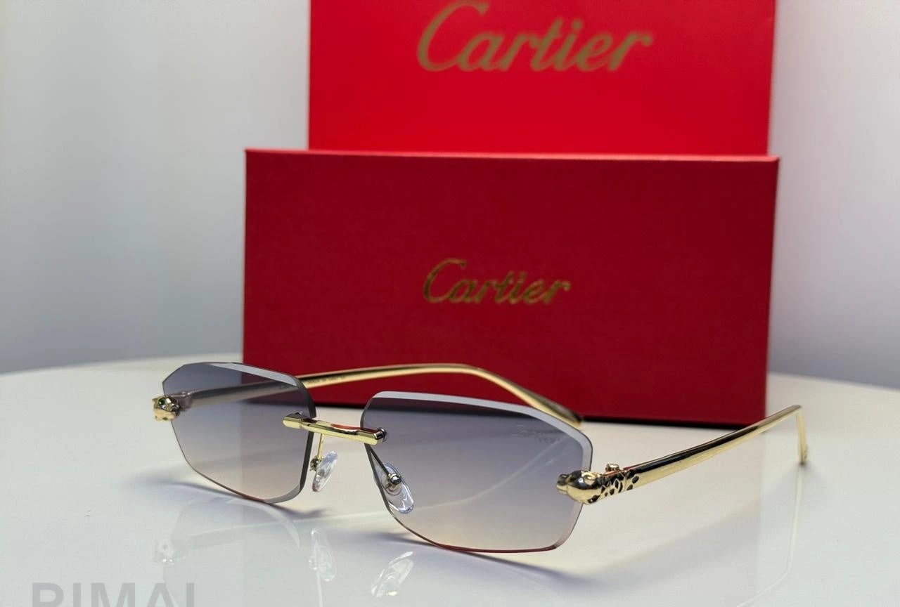 كارتييه | نظارة شمسية Panthère de Cartier بدون إطار - ذهبي / شفاف