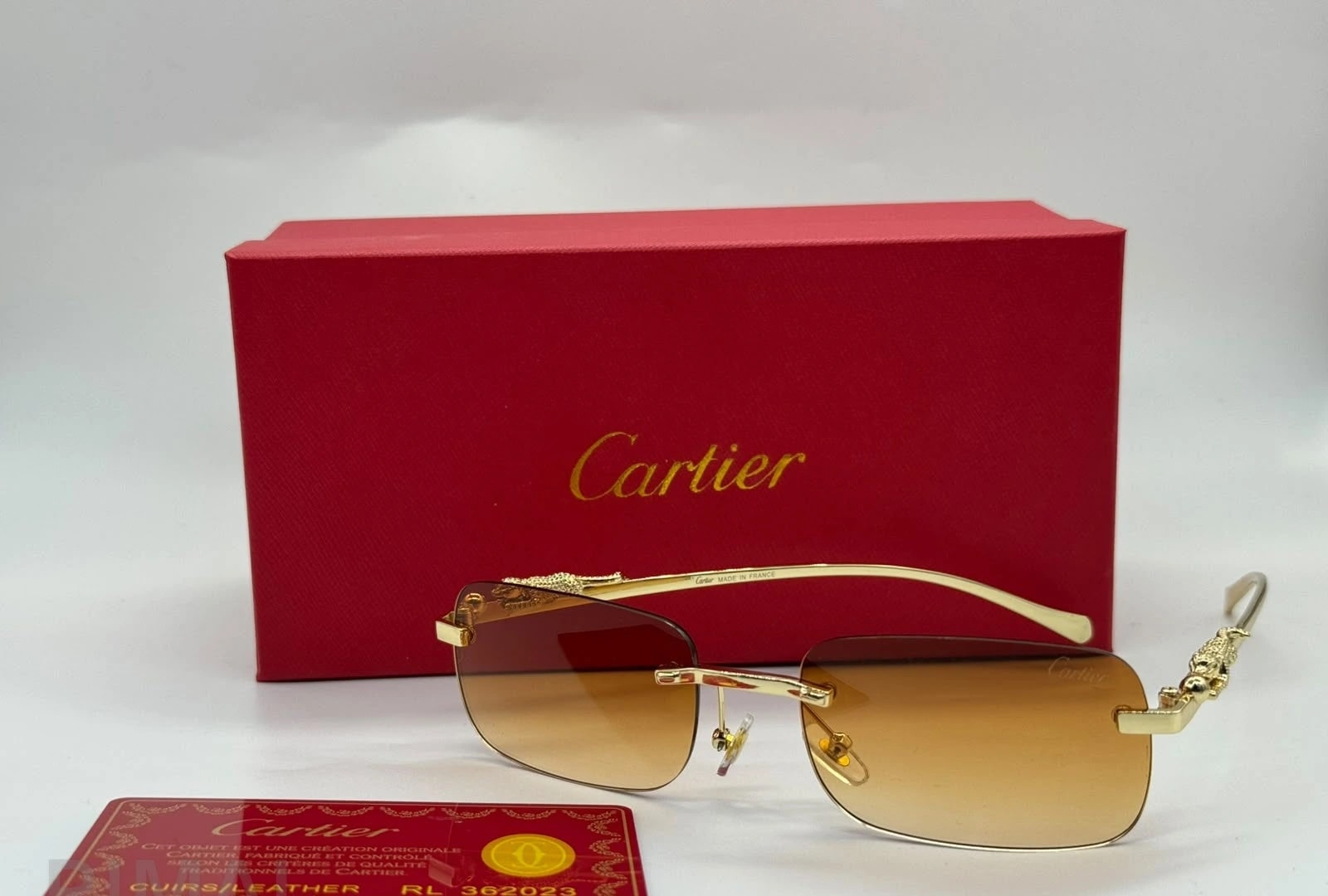كارتييه | نظارة C de Cartier بدون إطار – ذهبي / شفاف